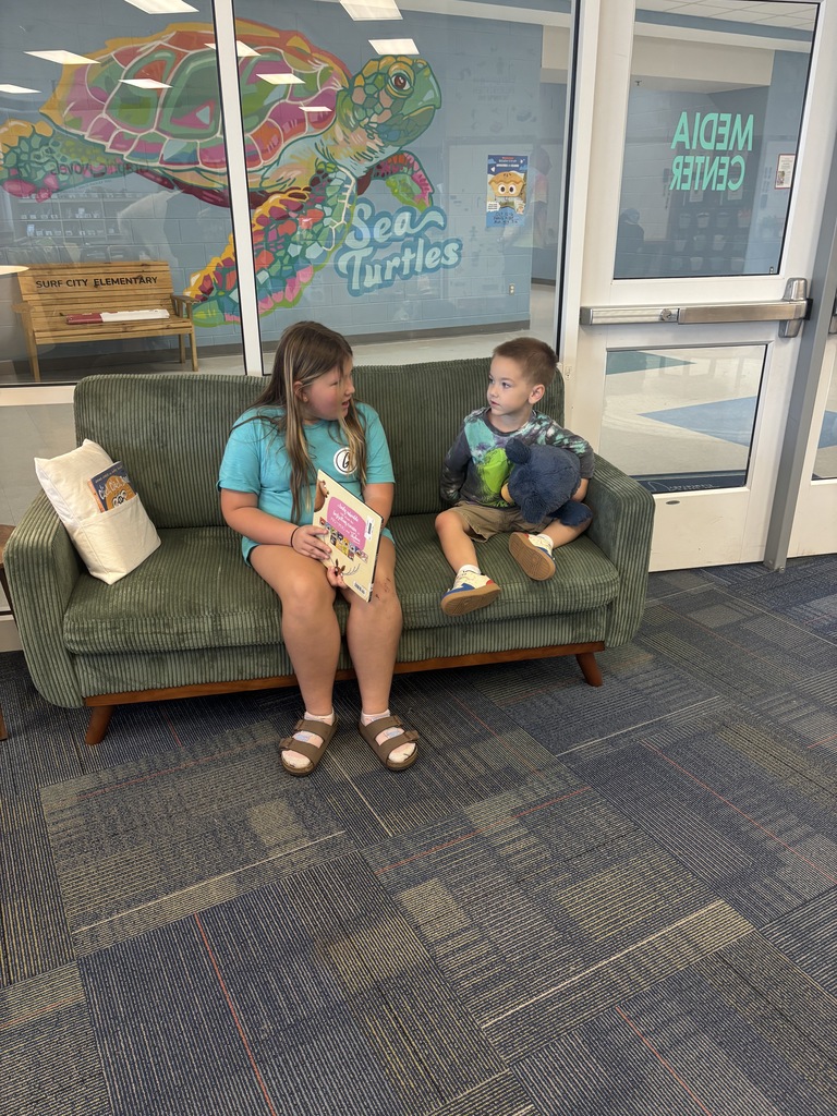 older students reading to younger students