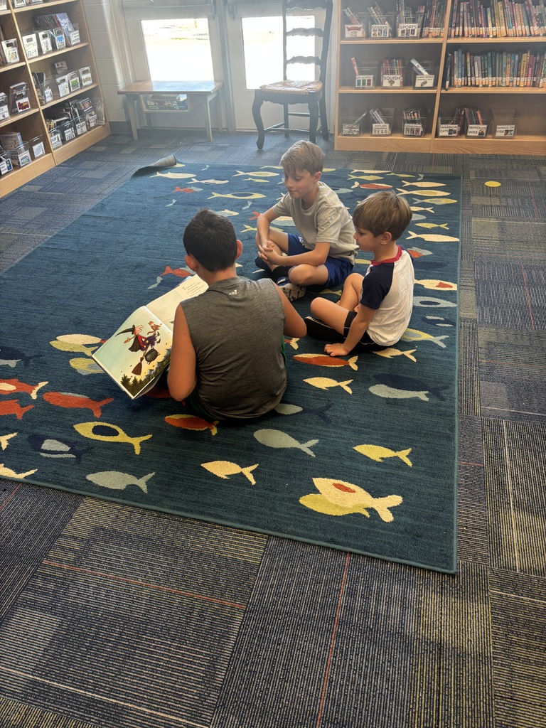 older students reading to younger students