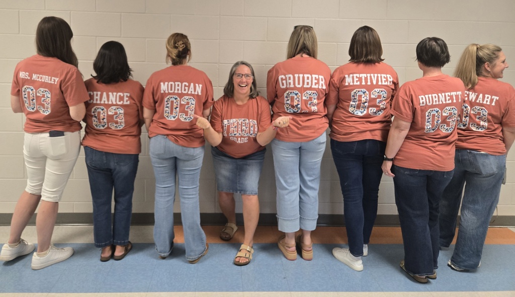3rd grade teachers wearing matching tshirts 