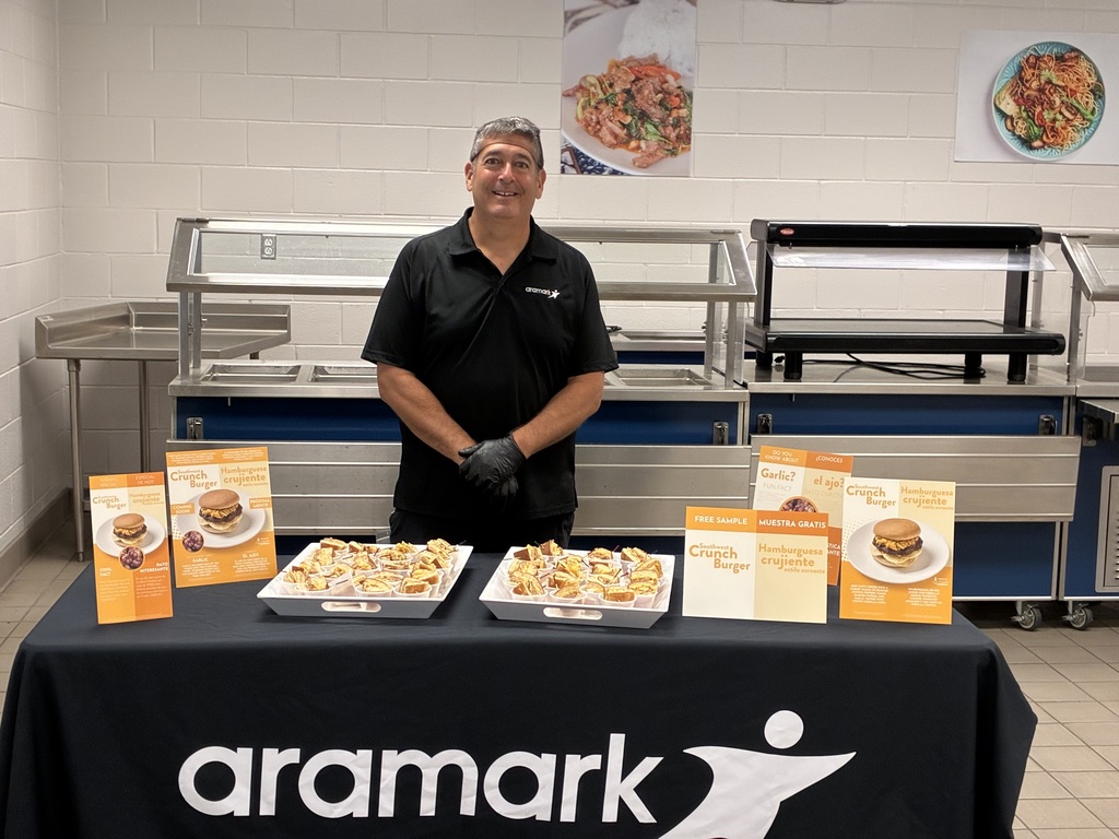 Chef Jeff at Surf City Middle serving samples of the Southwest Crunch Burger
