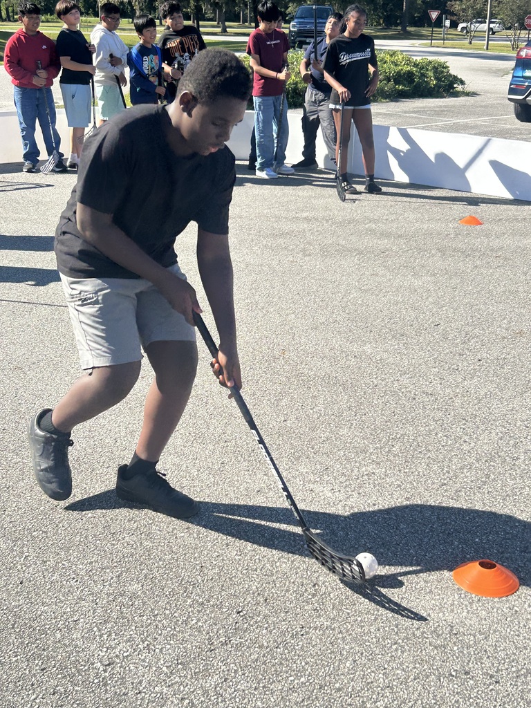 CFM After School enjoyed a visit from the UNCW men's hockey team head coach and the Wilmington Arena Project! Students learned about ball hockey, practiced their skills, and put them to the test.