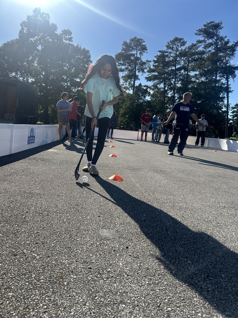 CFM After School enjoyed a visit from the UNCW men's hockey team head coach and the Wilmington Arena Project! Students learned about ball hockey, practiced their skills, and put them to the test.
