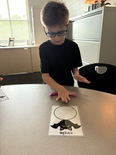 elementary students working in speech class