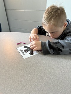 elementary students working in speech class