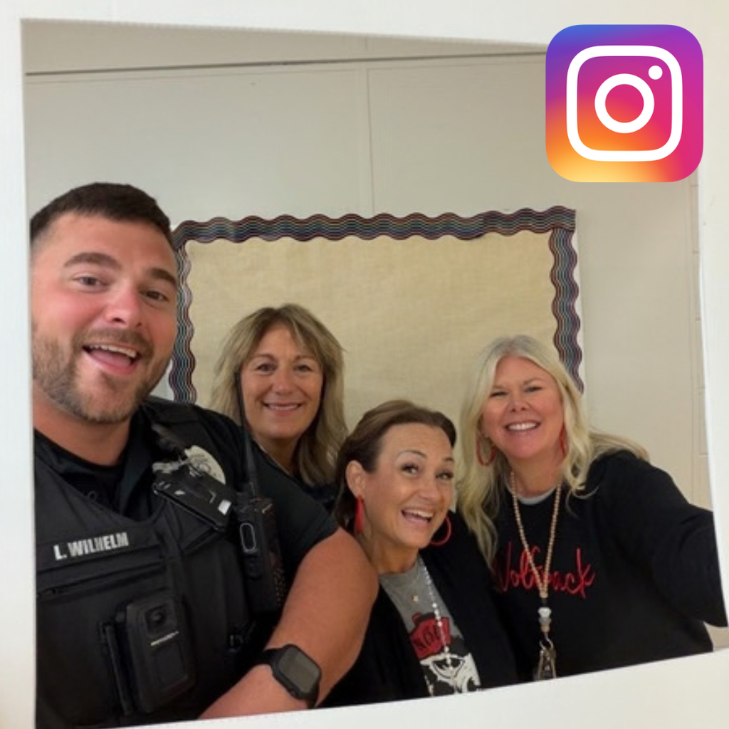 staff and teachers smiling