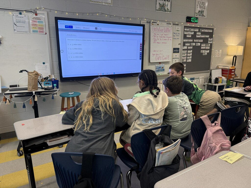 5th graders playing a game in their classroom