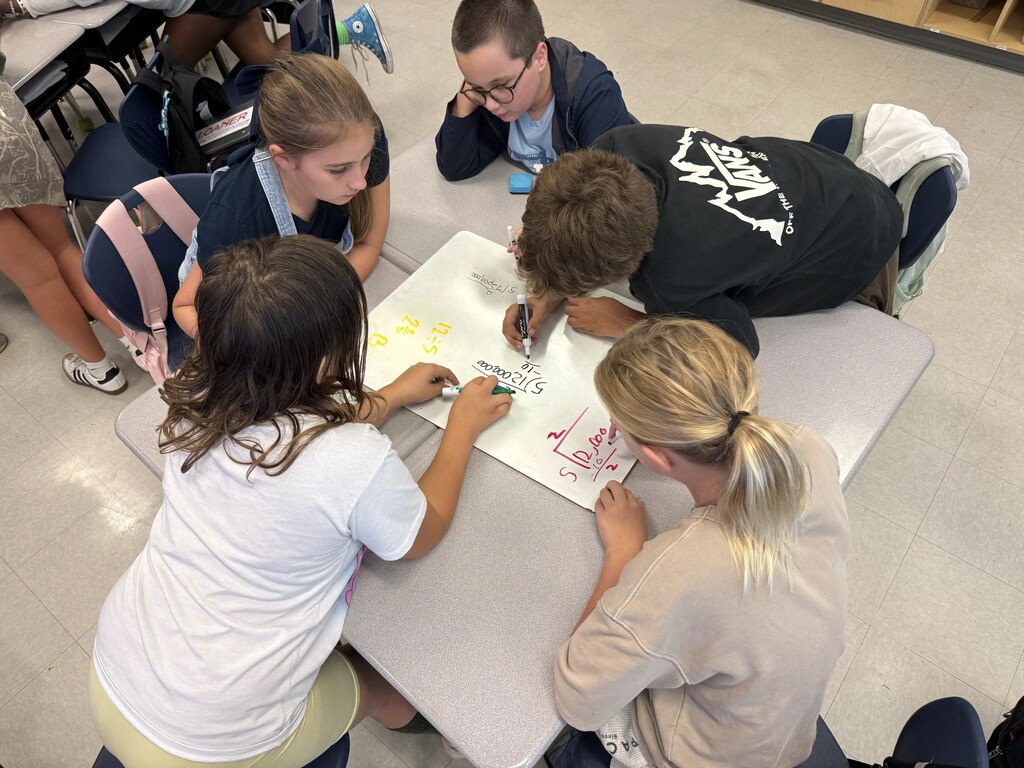 5th graders playing a game in their classroom