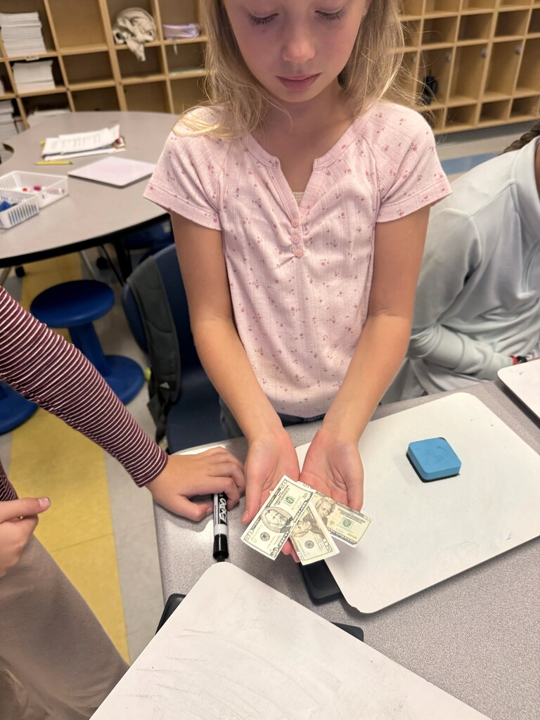 5th graders playing a game in their classroom