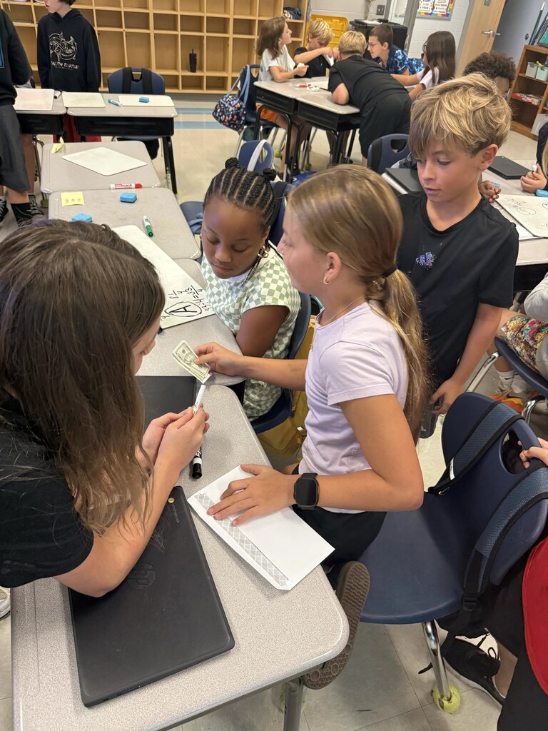 5th graders playing a game in their classroom