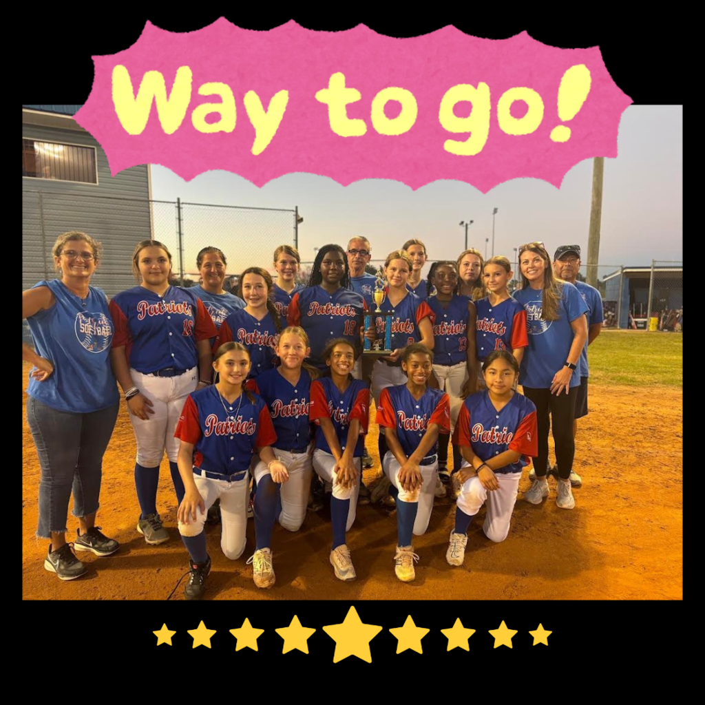 softball team posing with coaches at championship game