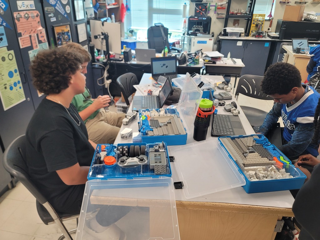 Last but certainly not least, we have 8th grade Robotics! They started building their first custom robots. They are working in teams and moving fast because they are excited to be able to drive them!