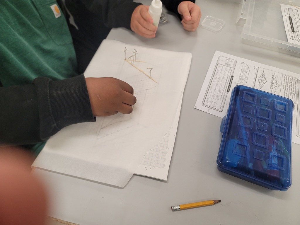 In 6th grade Engineering, the kids are working hard on building their toothpick bridges! They are looking forward to testing them to see whose is the strongest.