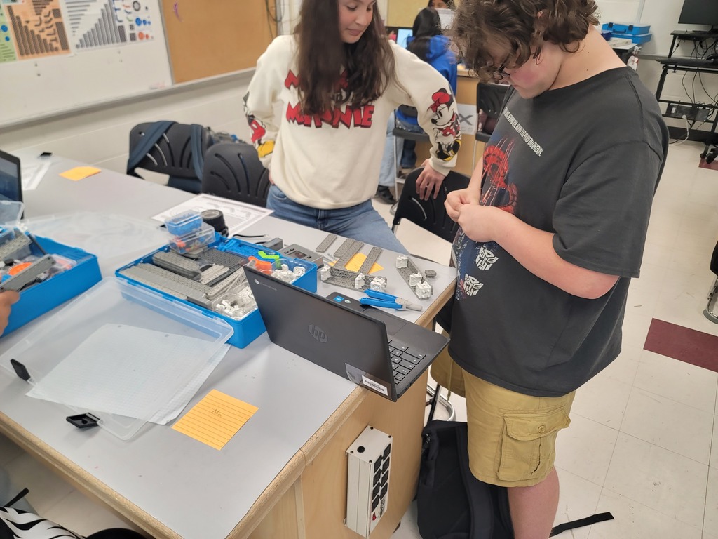 Last but certainly not least, we have 8th grade Robotics! They started building their first custom robots. They are working in teams and moving fast because they are excited to be able to drive them!