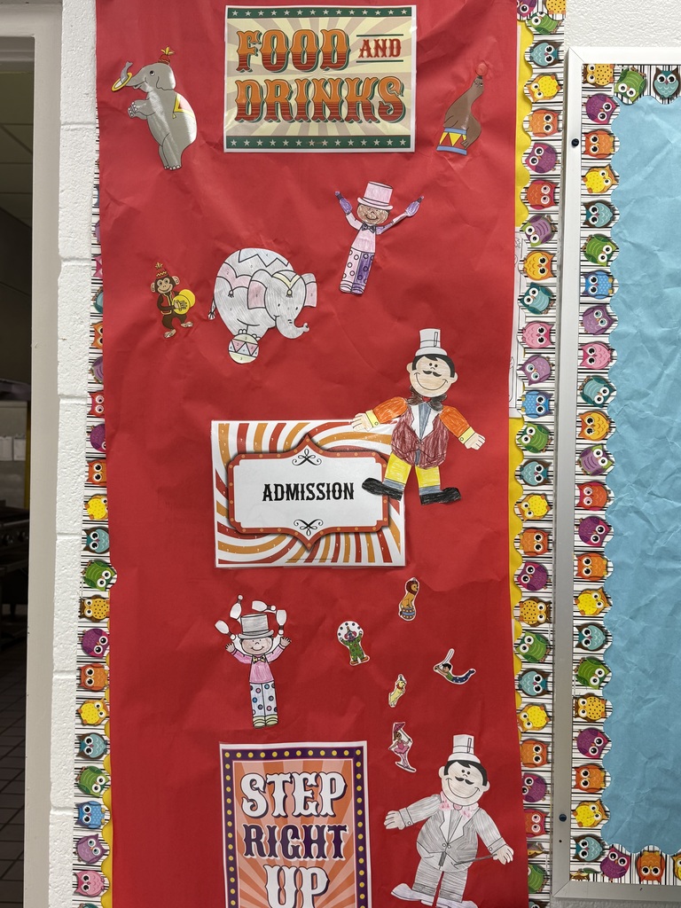 Malpass Corner Students in Afterschool Program helped with the decorations - photo shows colored circus theme pictures posted to bulletin board