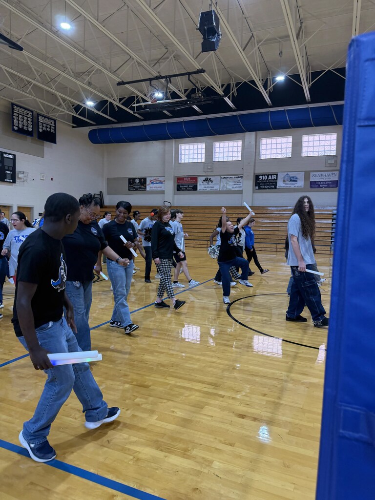 students dancing on gym floor 2