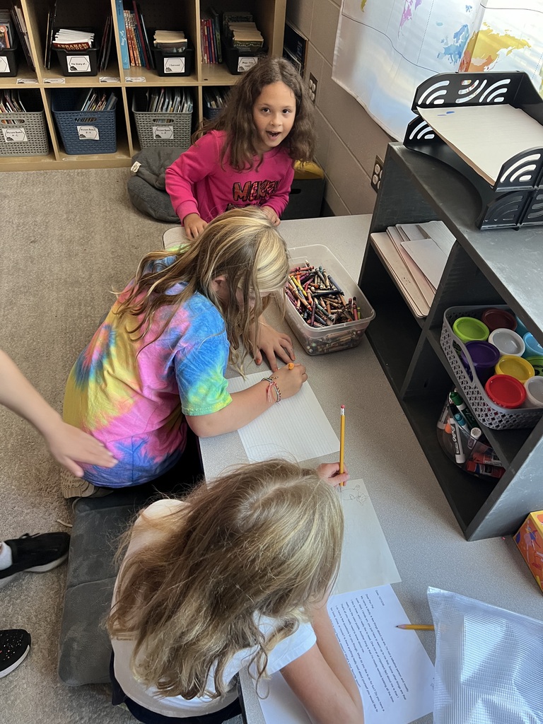 2nd graders working on an activity in small groups