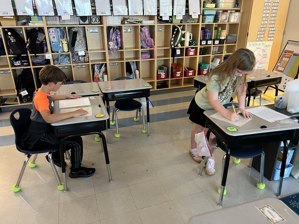 2nd graders working on an activity in small groups