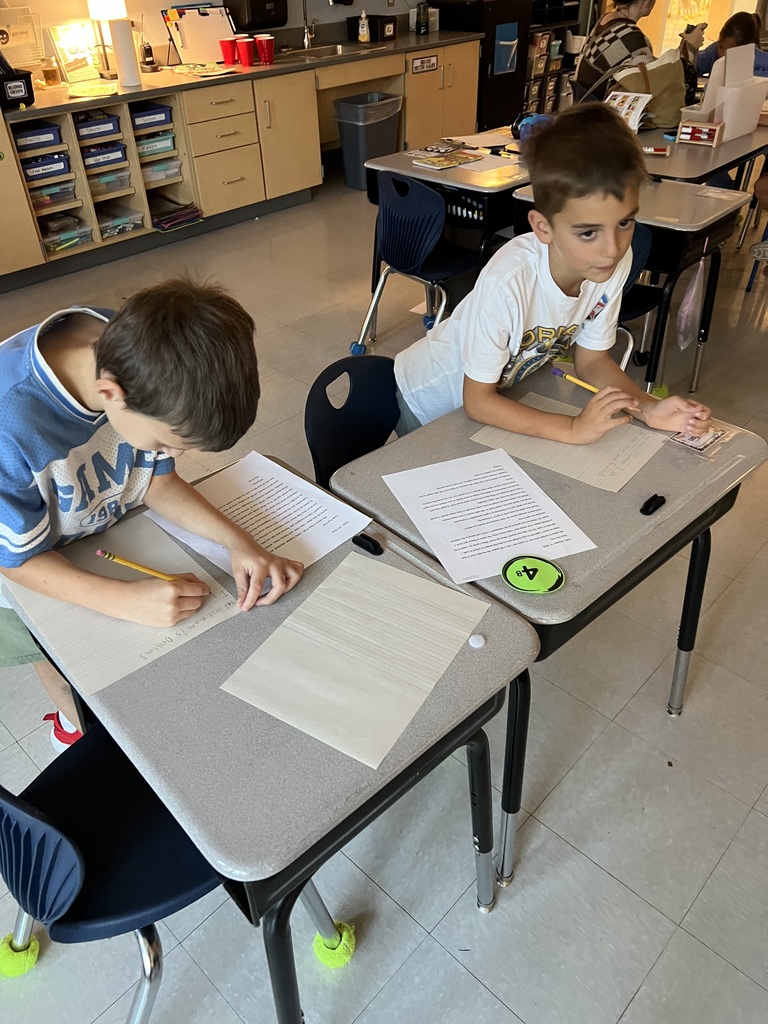 2nd graders working on an activity in small groups