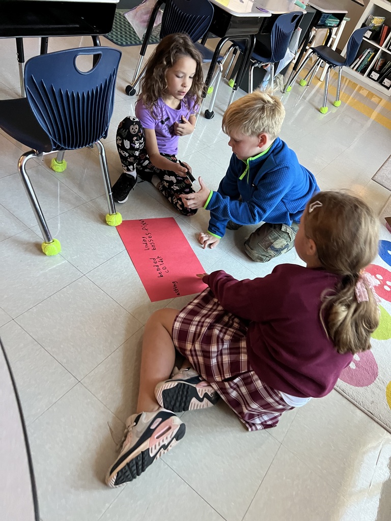 2nd graders working on an activity in small groups