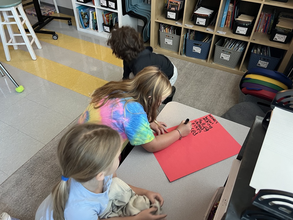 2nd graders working on an activity in small groups