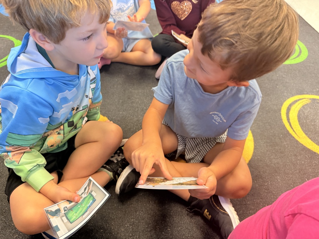 Kindergarten students working together in pairs
