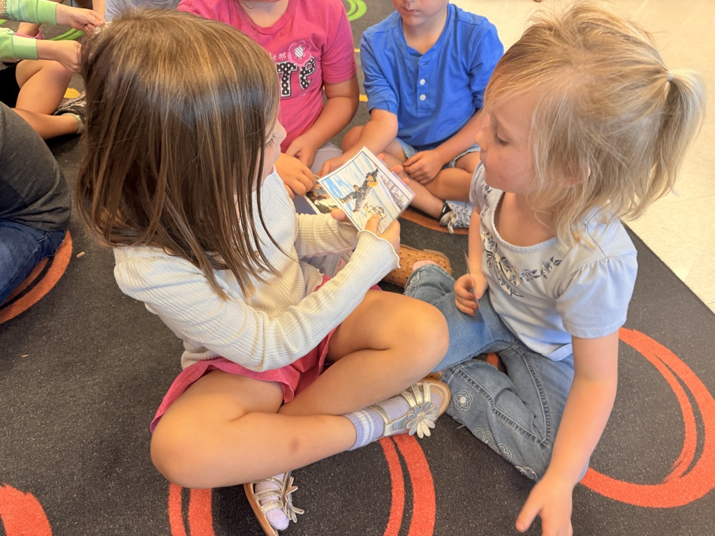 Kindergarten students working together in pairs