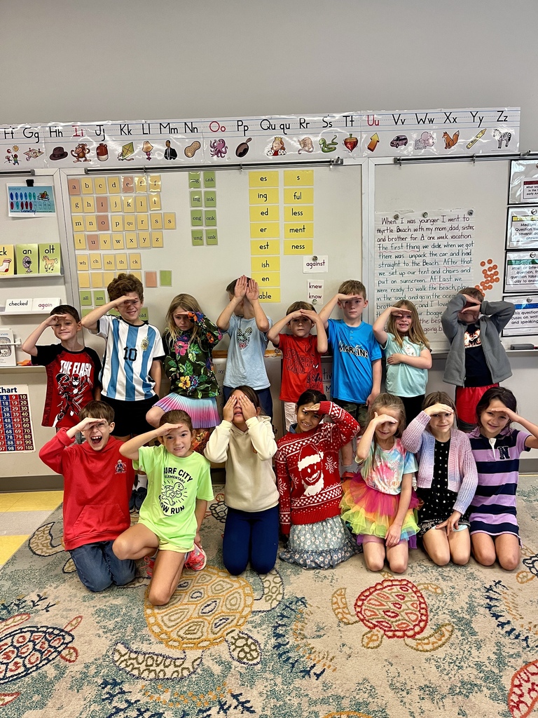 2nd graders wearing bright colors