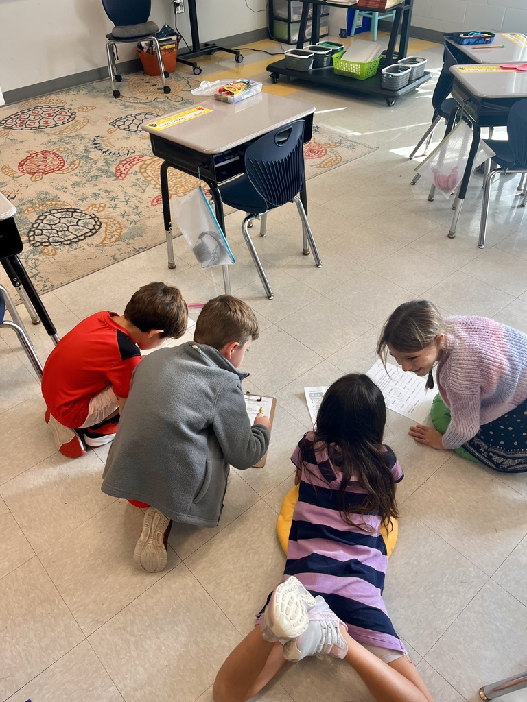 2nd grade students working on a vocabulary activity 