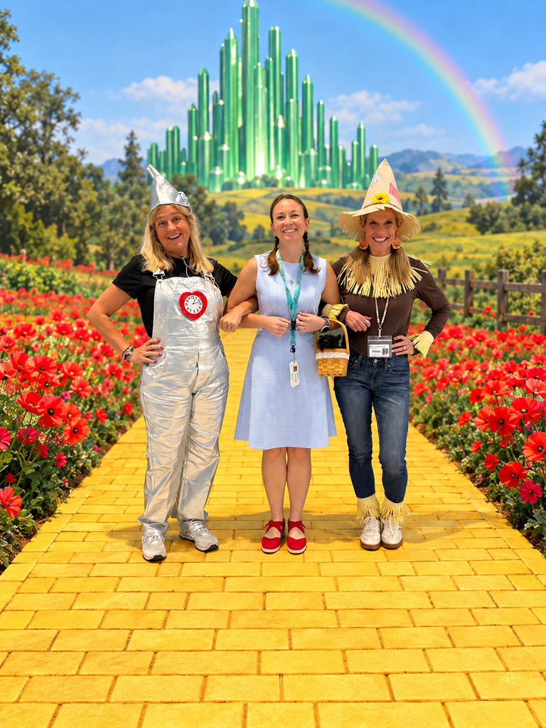 teachers dressed up like the wizard of oz characters