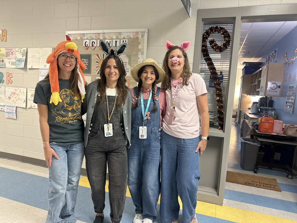 teachers dressed up as Old McDonald and farm characters