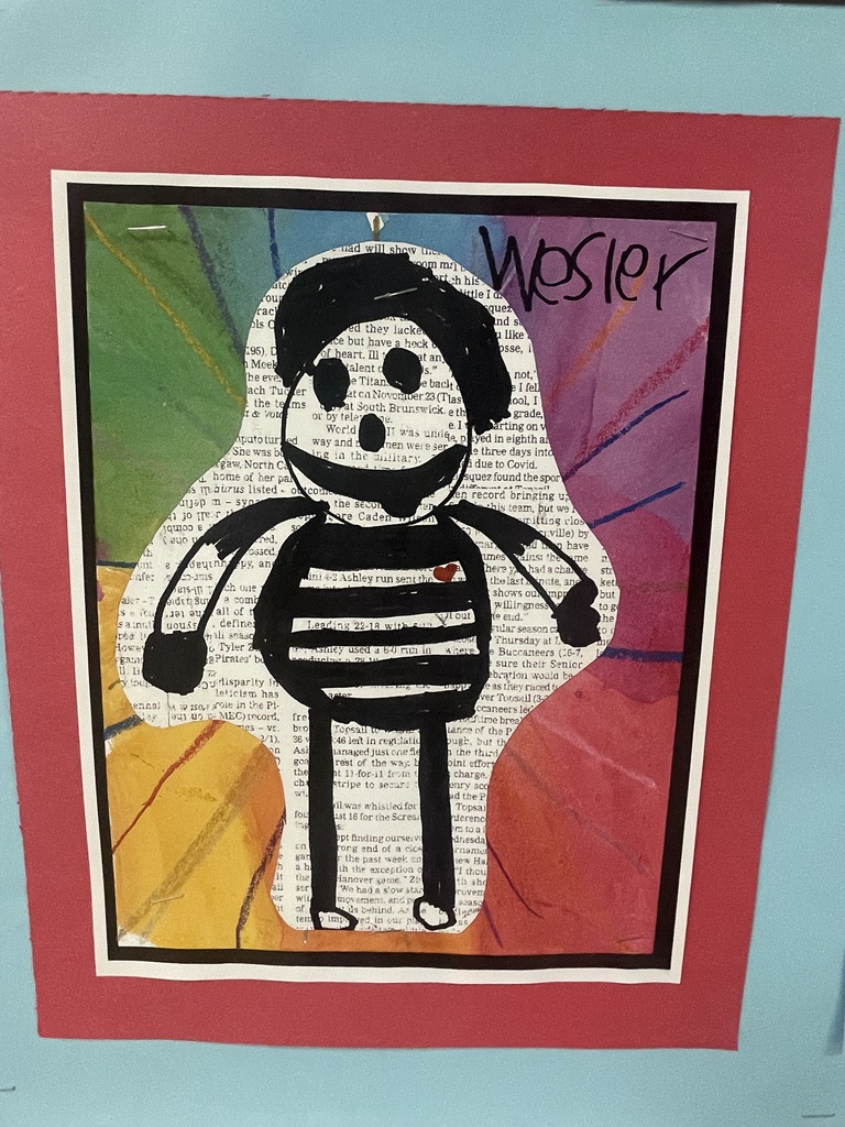 student art work hanging in the hallway