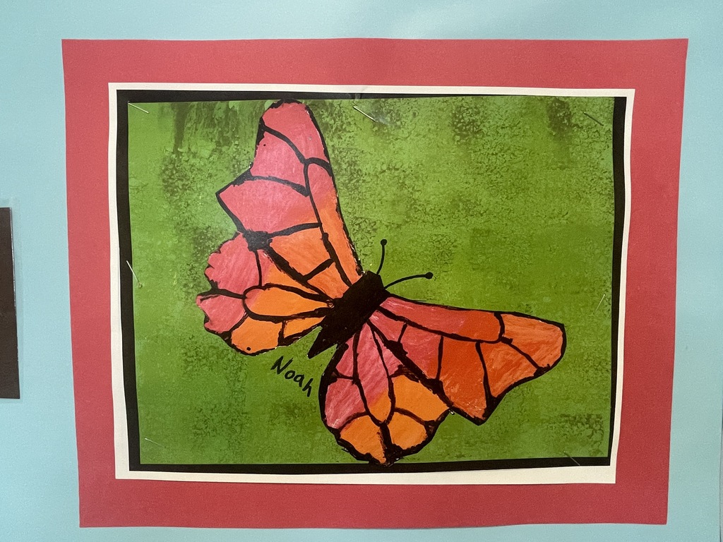 student art work hanging in the hallway
