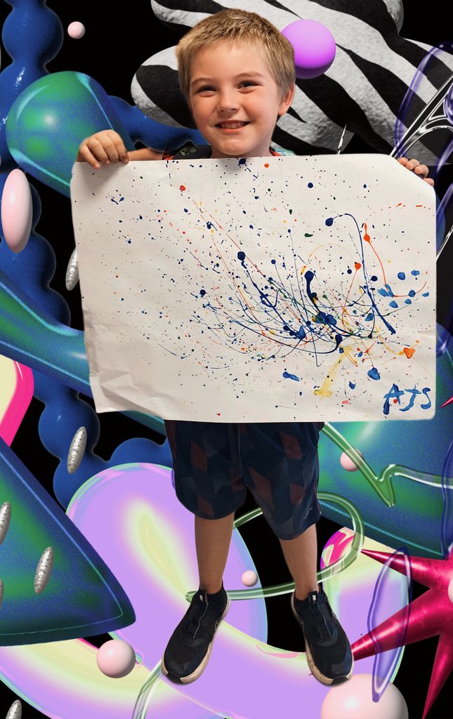3rd grade student holding up their painting art work