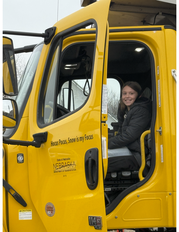 Makenna in the snow plow!