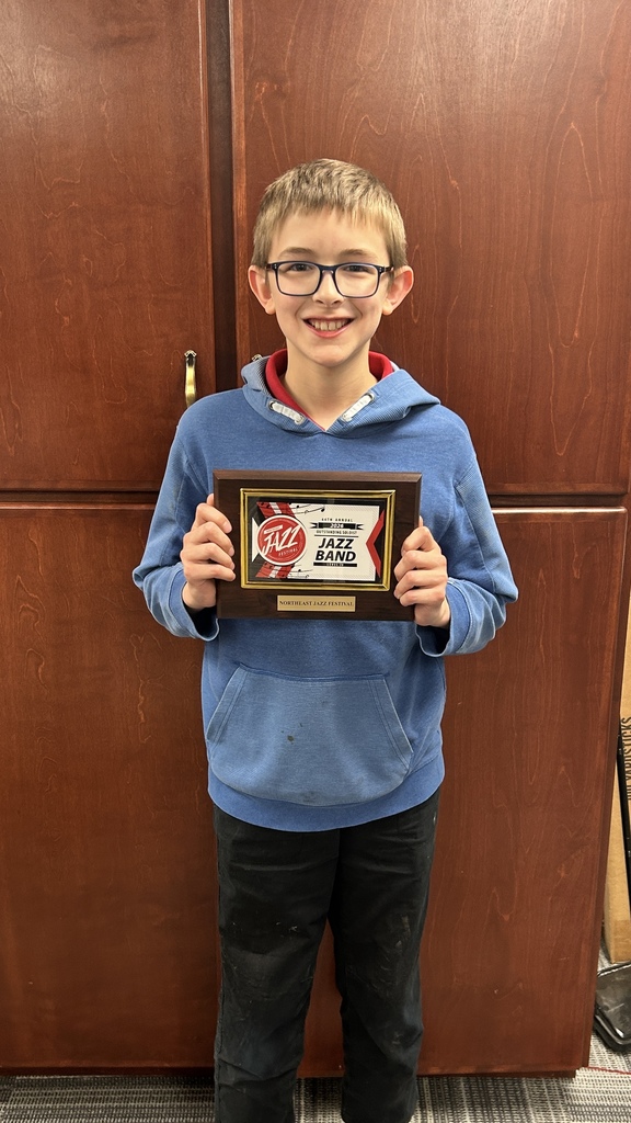 Colby Dregalla holding trophy