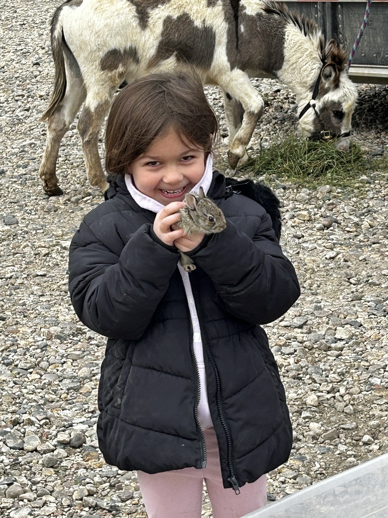 Brixlyn with her baby bunny 
