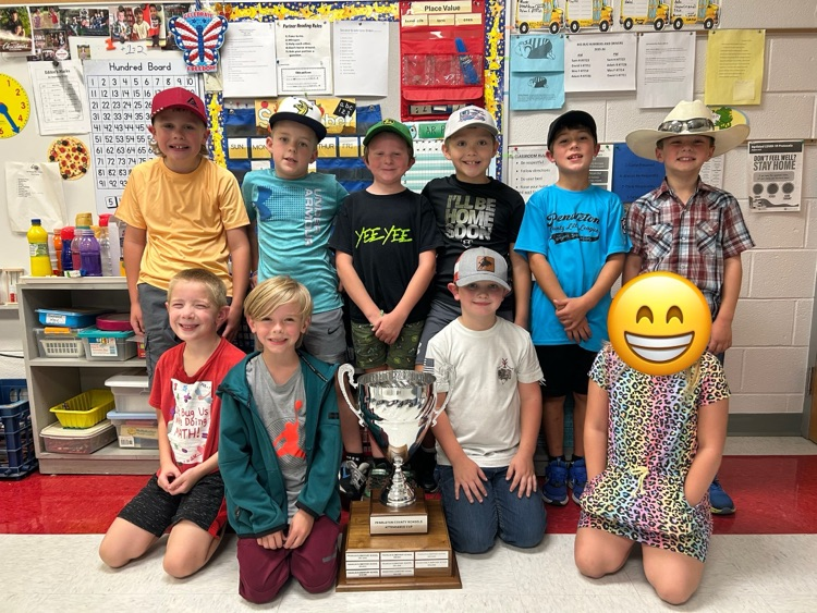 2nd grade students posing with attendance trophy!