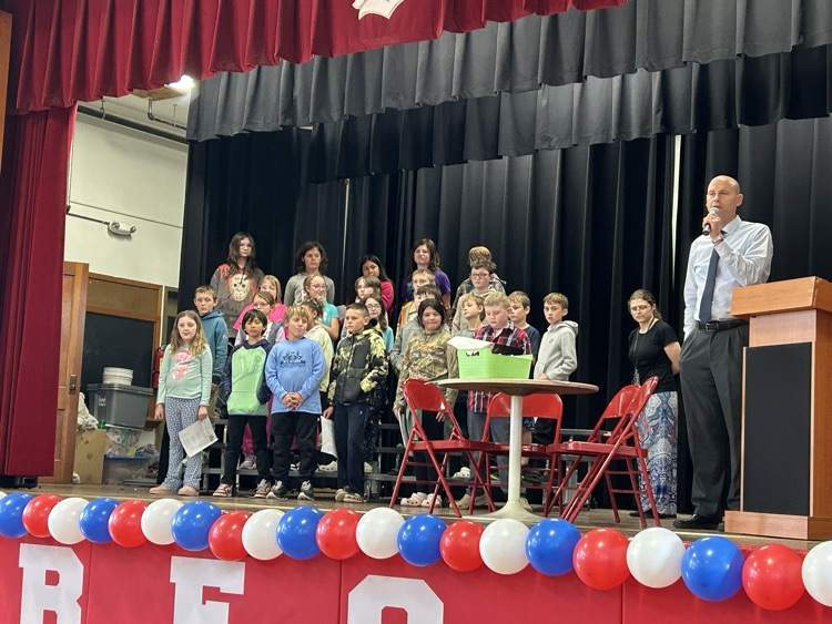 3rd and 4th grade perform patriotic song