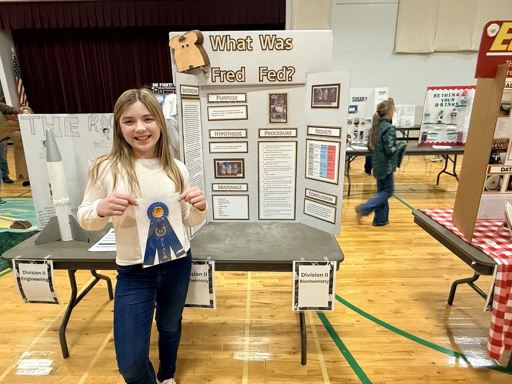 6th grade social studies fair participant with board