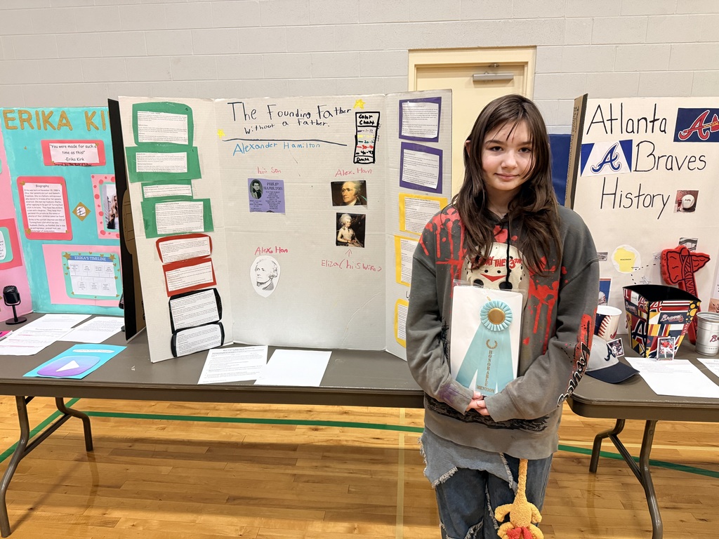 5th grade social studies fair participant with board