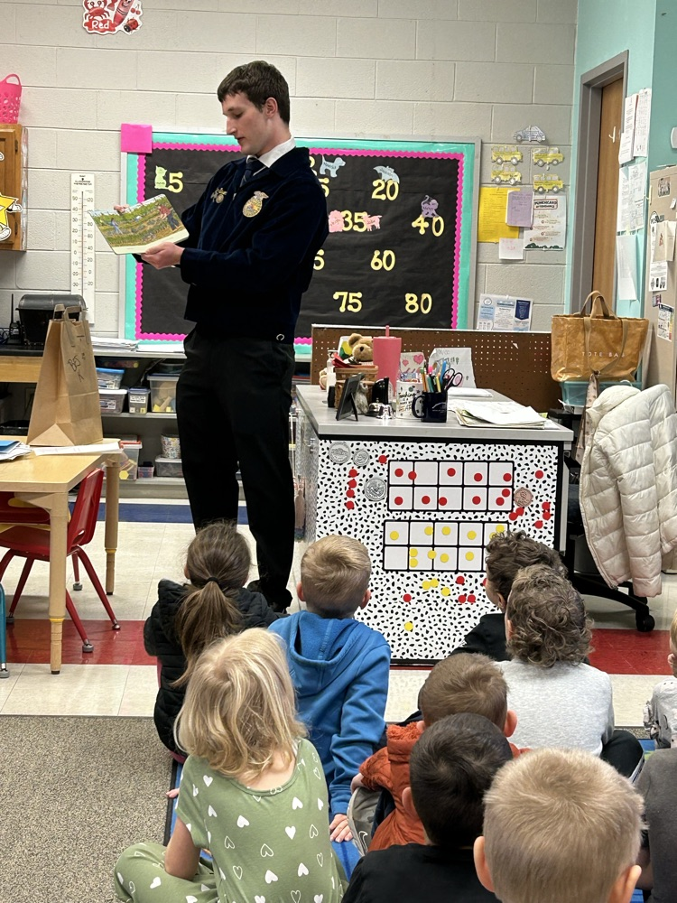 FFA student reading to a class. 