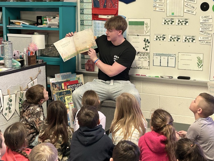 National Honor Society student coming to read to our classroom. 