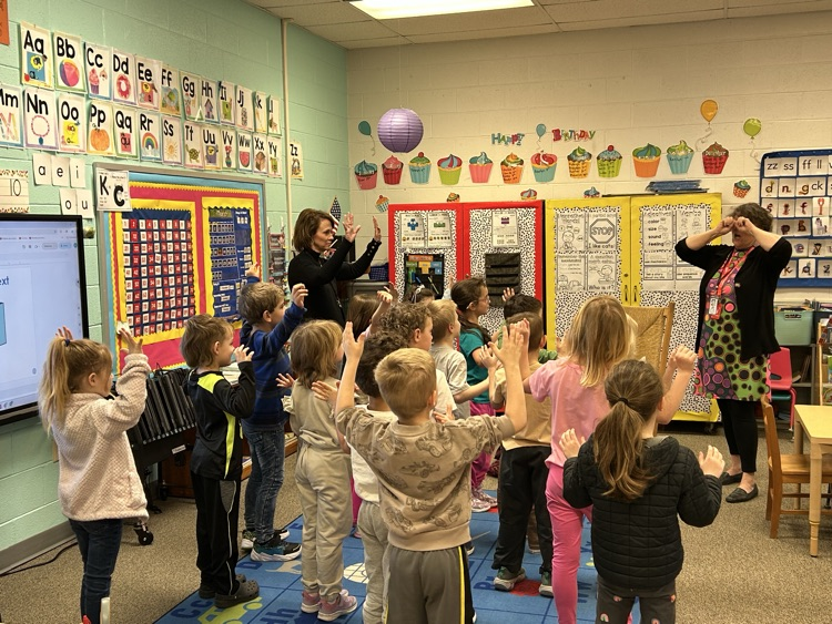 Students listening to author Ginny Neil. 