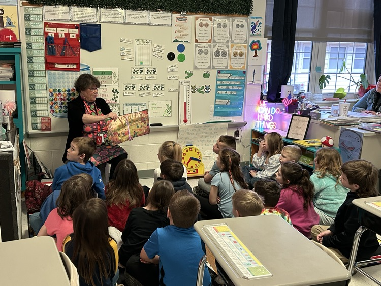 Students listening to author Ginny Neil. 