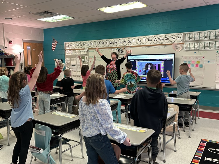 Students listening to author Ginny Neil. 