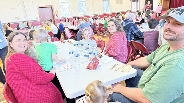 Families playing bingo for a prize! 