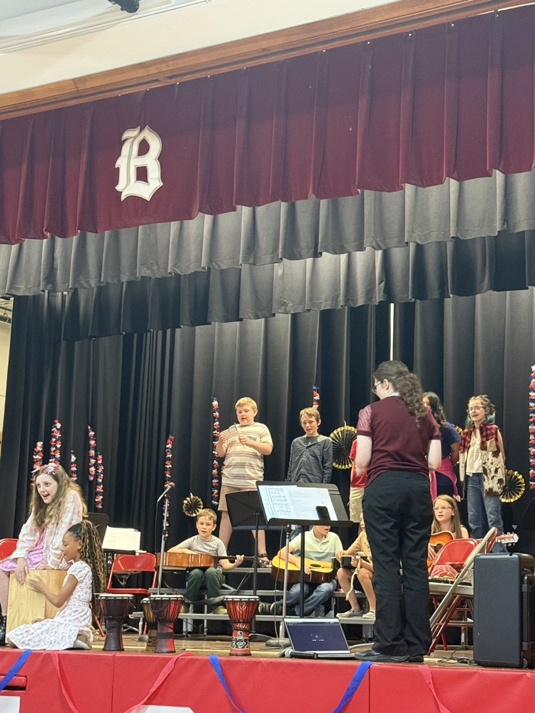 4th graders performing a song for the concert. 