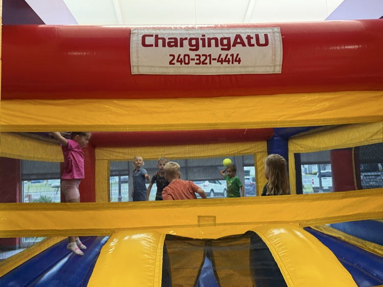 Students participating in the inflatable reward! 