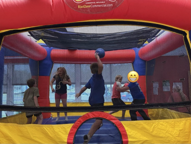 Students participating in the inflatable reward! 