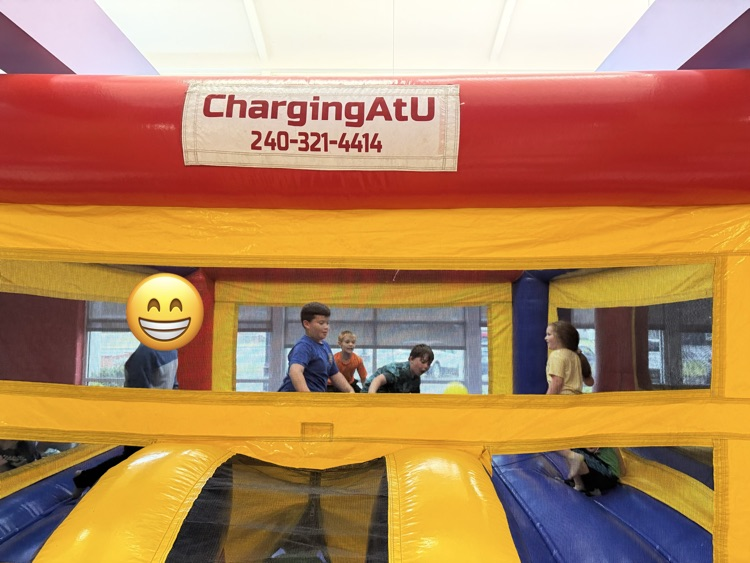 Students participating in the inflatable reward! 